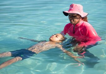 Matthew doing his first survival swimming lesson Image by Andrew Ingram