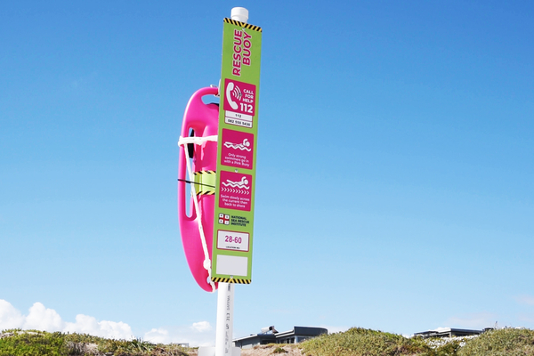 Pink rescue buoy bloubergstrand