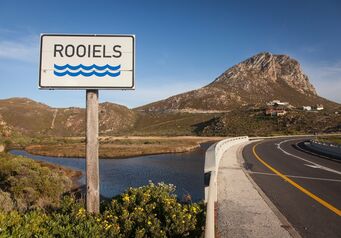Rooiels bridge sign river